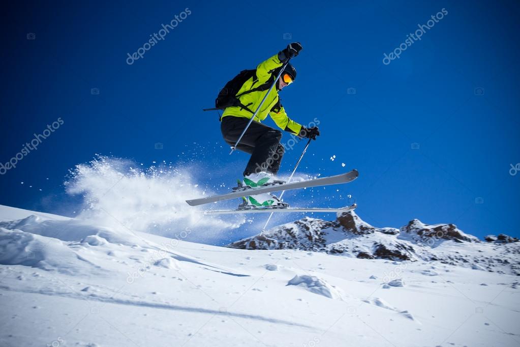 Skier in high mountains