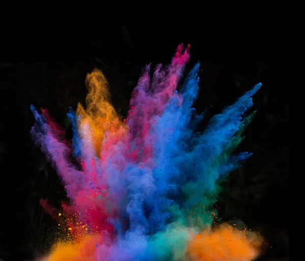 Launched colorful powder over black — Stock Photo, Image