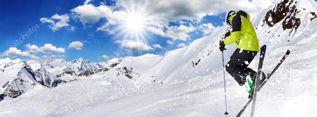 Skier in high mountains