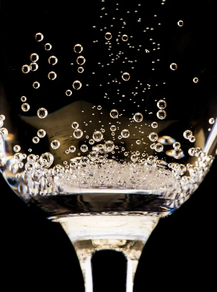 Champagne flutes on black background — Stock Photo, Image