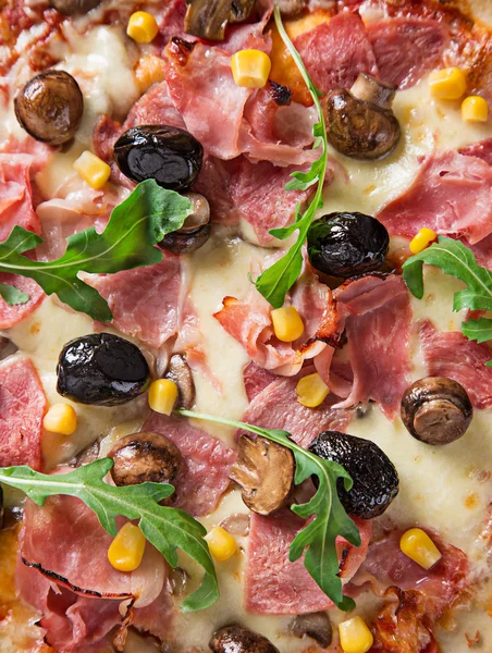 Delicious italian pizza served on wooden table — Stock Photo, Image