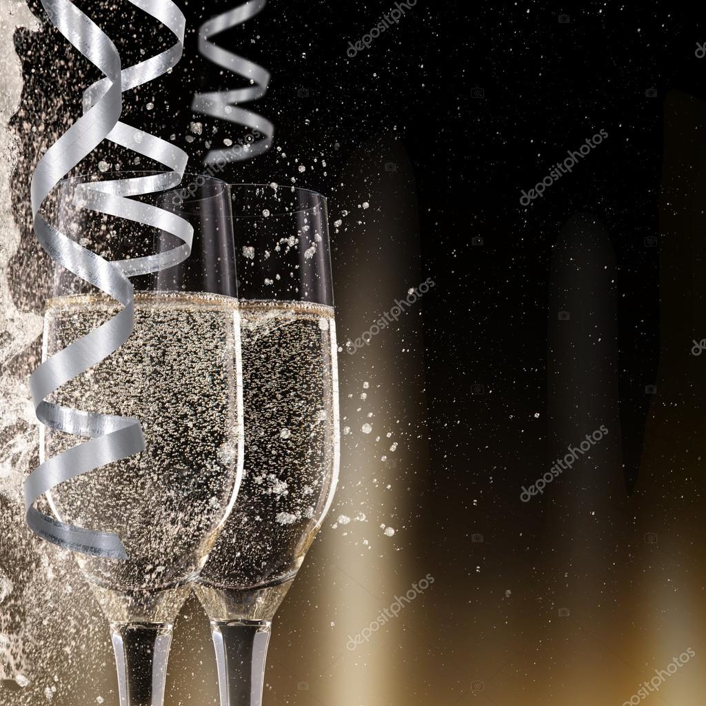 Champagne flutes on black background Stock Photo by ©Kesu01 58939497