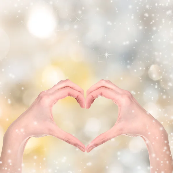 Woman hand on Christmas background — Stock Photo, Image