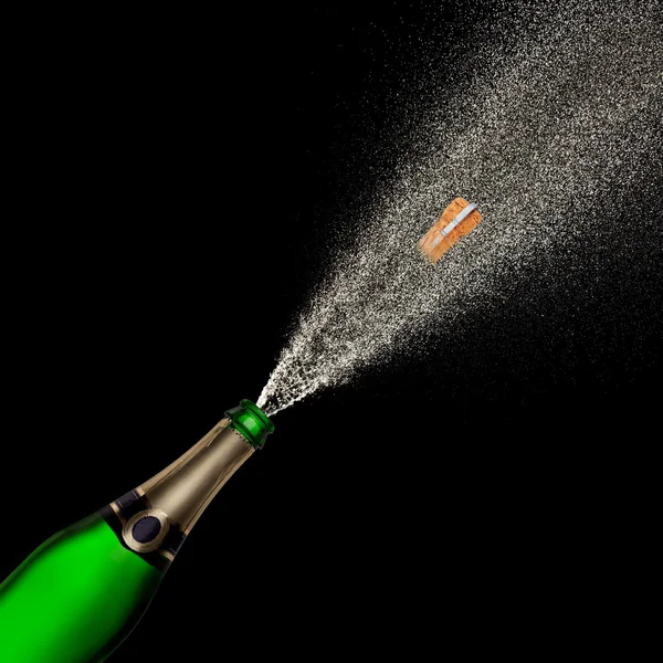 Champagne explosie op zwarte achtergrond — Stockfoto