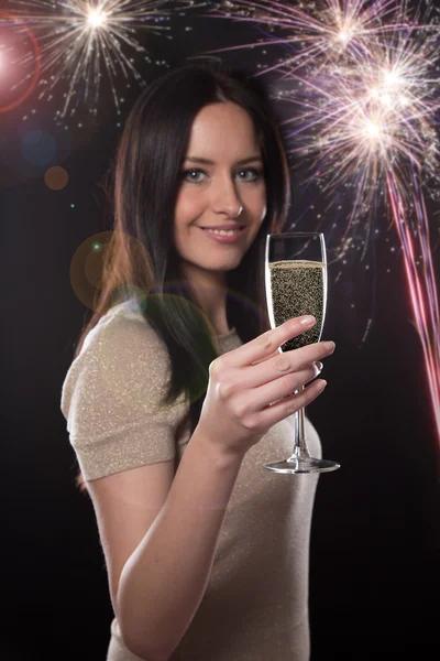 Young brunette woman with champagne glass — Stock Photo, Image