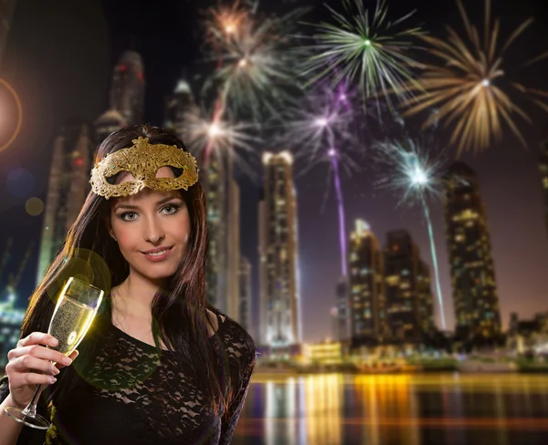 Young brunette woman with champagne glass — Stock Photo, Image