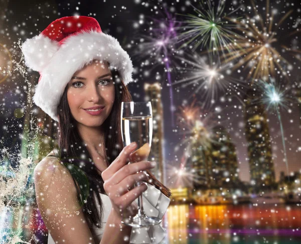 Şampanya Kadehi ile genç Noel Baba kız Stok Resim
