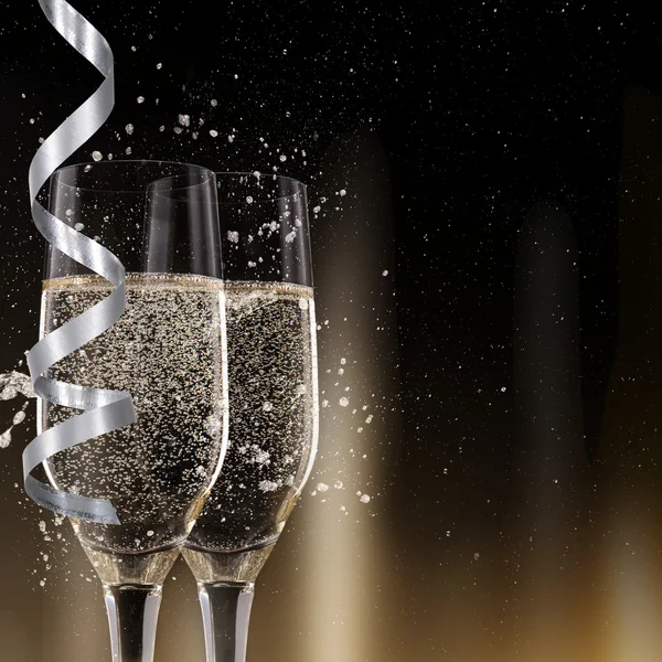 Šampaňské flétny na černém pozadí — Stock fotografie