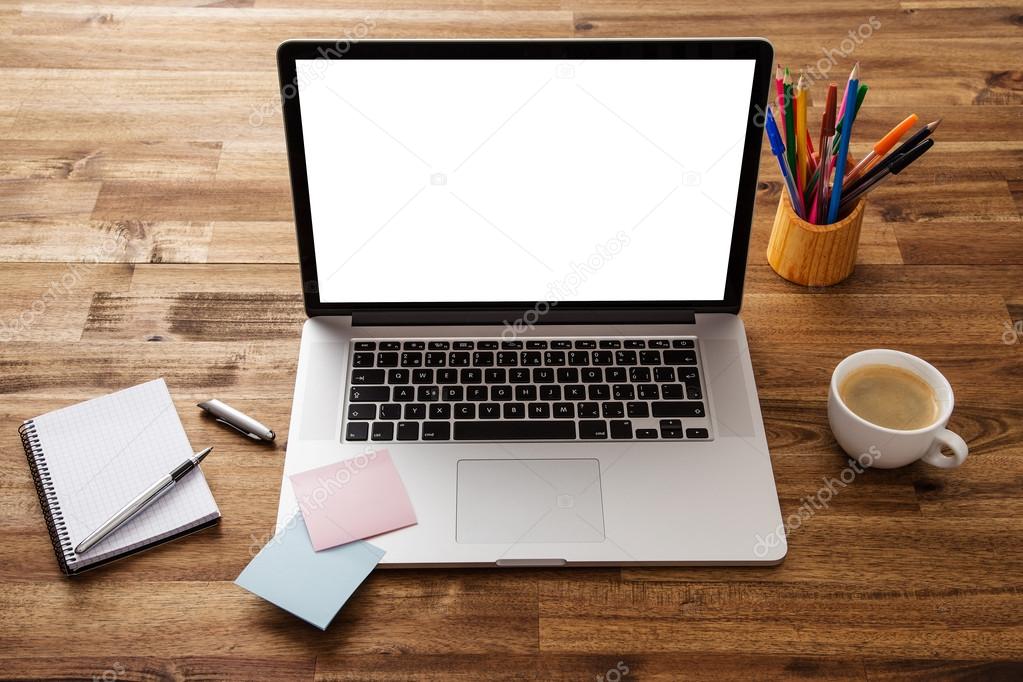 Office workplace with wooden desk.