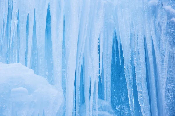 Frozen waterfall of blue icicles — Stock Photo, Image