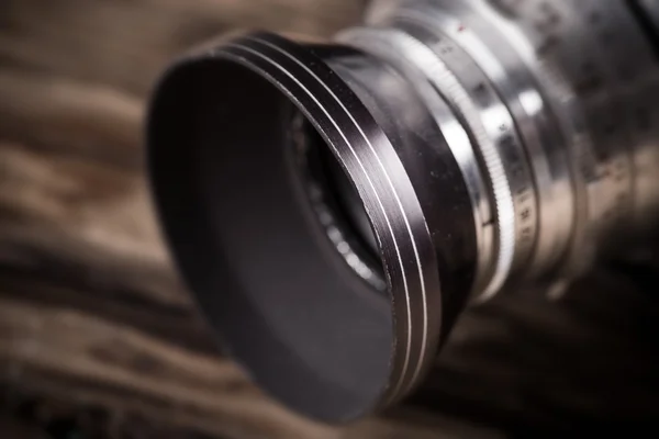 Vintage camera on a wooden background — Stock Photo, Image