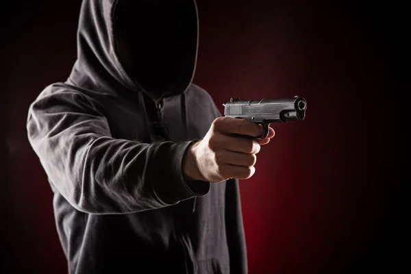 Killer with gun close-up — Stock Photo, Image