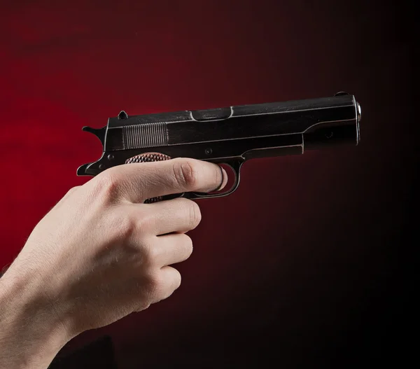 Killer with gun close-up — Stock Photo, Image