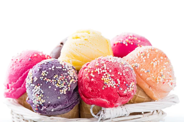 Ice cream scoops on wooden table. — Stock Photo, Image