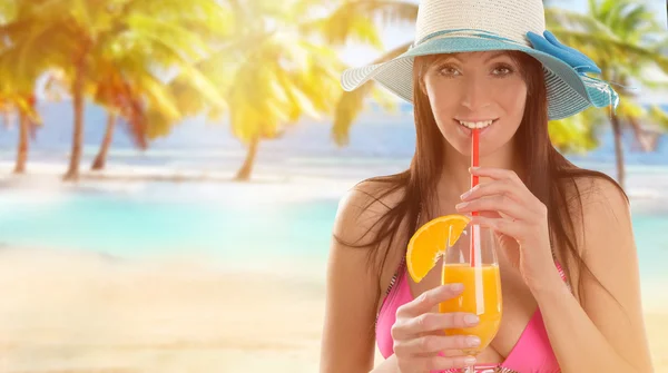 Young sexy brunette in pink swimsuit — Stock Photo, Image