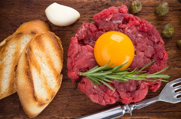 Fresh beef tartar with egg — Stock Photo, Image