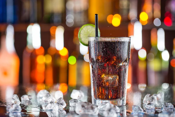 Glass of cola on bar desk — Stock Photo, Image