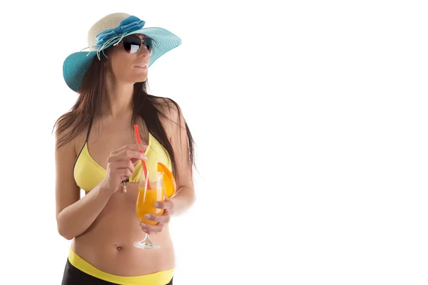 Young sexy brunette in yellow swimsuit — Stock Photo, Image