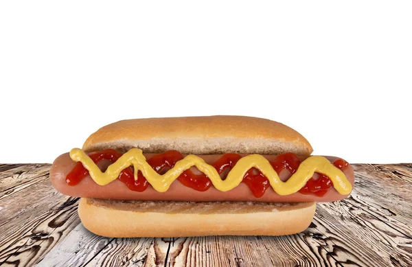 Hot dog on wooden background — Stock Photo, Image