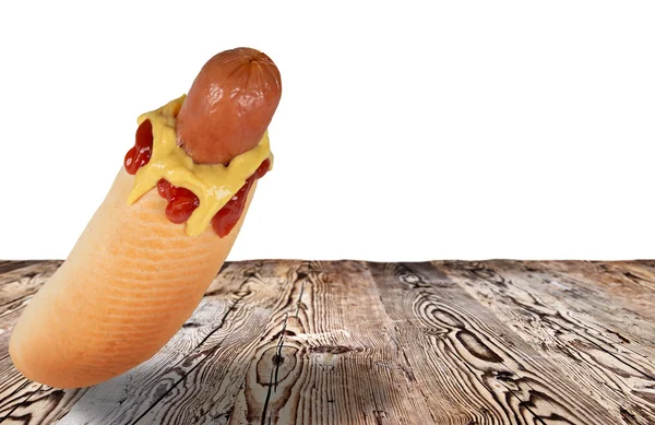 Hot dog on wooden background — Stock Photo, Image