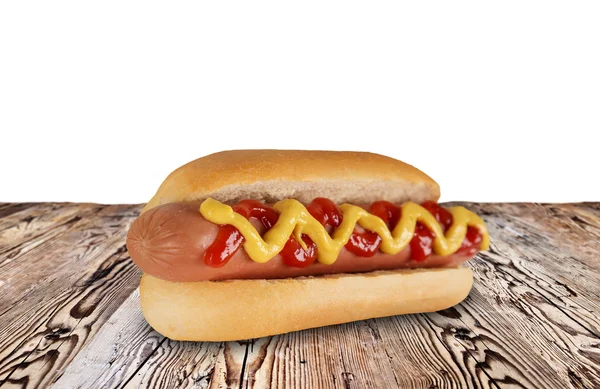 Hotdog op houten achtergrond — Stockfoto