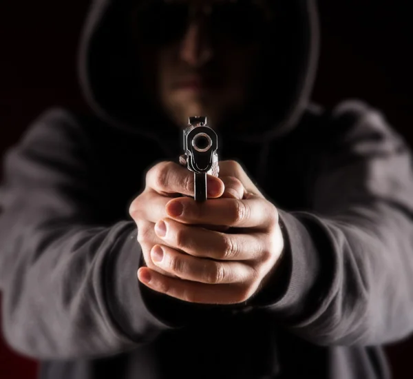 Killer with gun. — Stock Photo, Image