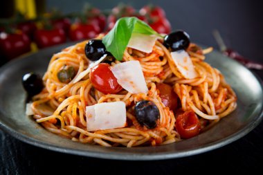 Italian pasta with tomato and basil clipart