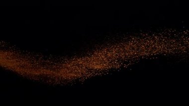 Uçan Turuncu Çamurun Süper Yavaş Çekimi, Siyah Arkaplan 'da izole edilmiş, Yüksek Hız Sinema Kamerası' nda 1000 FPS 'de çekilmiştir.