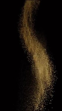 Uçan Kum 'un Süper Yavaş Çekimi, Siyah Arkaplan' da izole edilmiş, Yüksek Hız Sinema Kamerasında 1000 FPS 'de çekilmiştir.