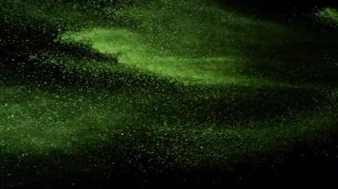 Uçan Yeşil Kibrit Tozu 'nun Süper Yavaş Çekimi, Siyah Arkaplan' da izole edilmiş, Yüksek Hız Sinema Kamerası 'nda 1000 FPS' de çekilmiştir.