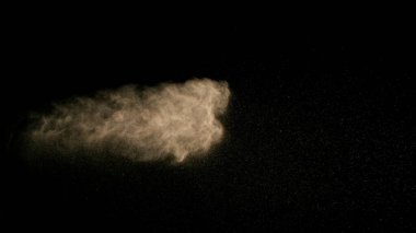 Donmuş Kum Tozu Çekimi Kara Arkaplanda İzole Edildi