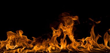 Fire flames on black background clipart