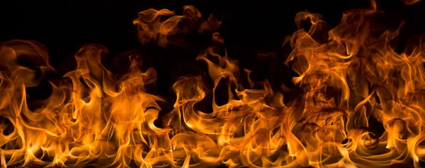 Fire flames on black background — Stock Photo, Image