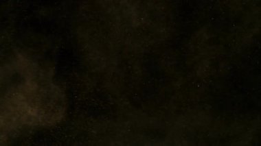 Uçan Kum Tozu 'nun Süper Yavaş Çekimi, Siyah Arkaplan' da izole edilmiş, Yüksek Hız Sinema Kamerası 'nda 1000 FPS' de çekilmiş.