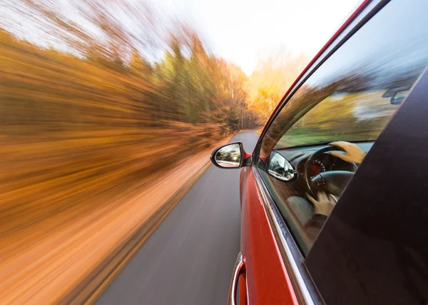 Speeding car with motion blur background. — Stock Photo, Image