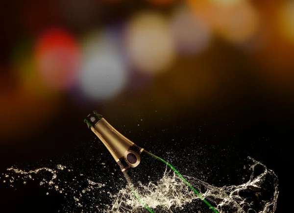 Bottle of champagne with splash — Stock Photo, Image
