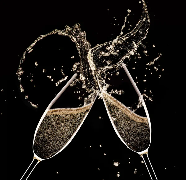 Glas champagne med splash — Stockfoto