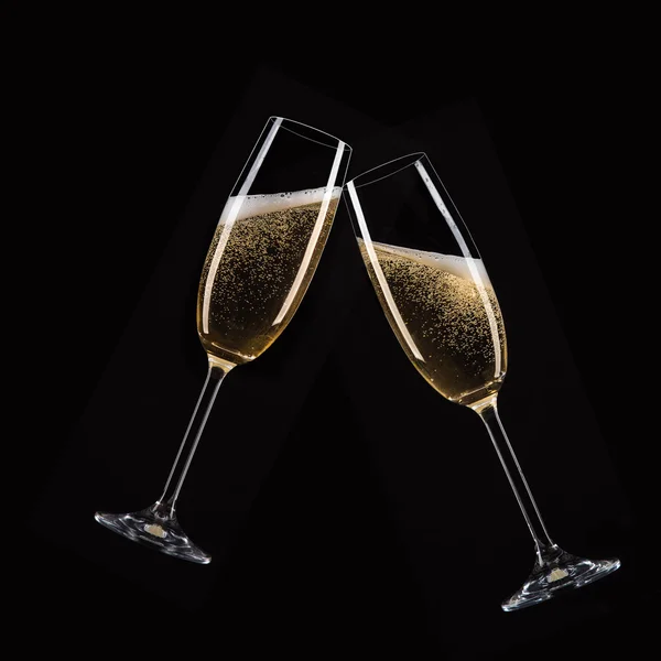 Glasses of champagne with splash — Stock Photo, Image