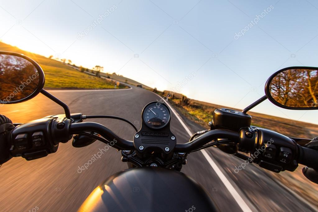 The view over the handlebars of motorcycle