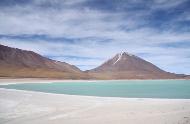 Green lagoon and Volcano in Atacama desert, Bolivia clipart