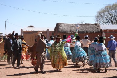 People dance at Fiesta in countryside of Bolivia, Andes clipart