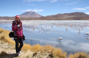 Young woman tourist in amazing Laguna Hedionda