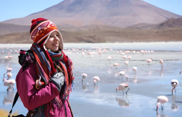 Happy woman travels in wild nature of Andes, Bolivia 스톡 이미지