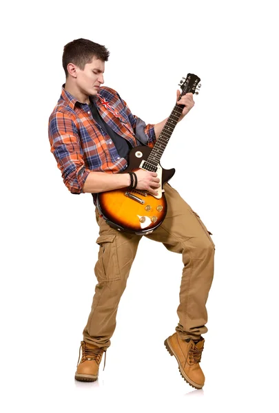 Jovem na camisa com guitarra — Fotografia de Stock