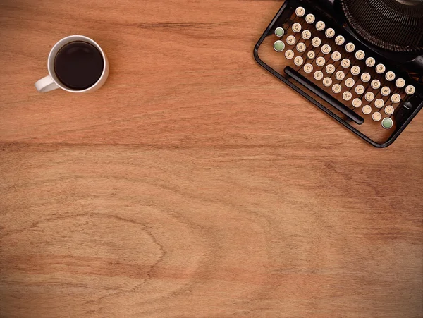 Typewriter and coffee cup — Stock Photo, Image