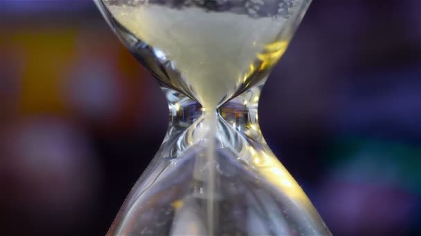 Sand Flowing Through An Hourglass. — Stock Video