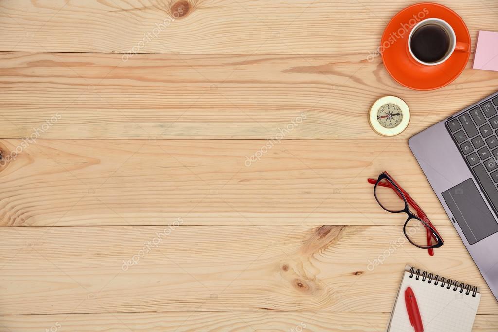 Laptop and material office desktop Stock Photo by ©vetkit 113751032