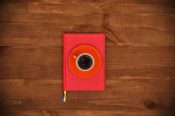 Diario rosso e tazza di caffè — Foto Stock