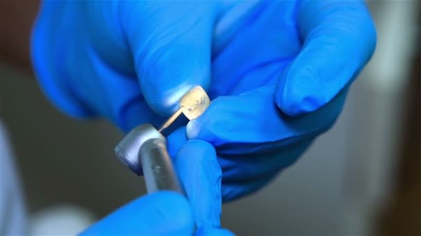 Dental Technician Polishing A Tooth. Close Up — Stock Video