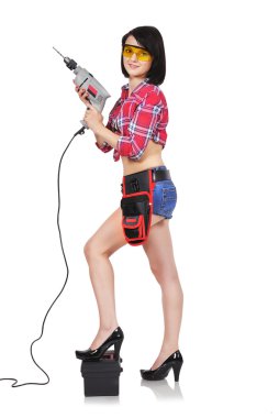 Elektrikli matkap tutan seksi kız
